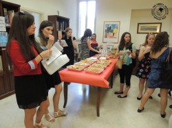 Students, staff, and faculty mingled in the library over snacks in between the Community Engagement presentations.