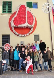The Sustainability class pose with Dario in front of his "To Beef or Not To Beef" mural